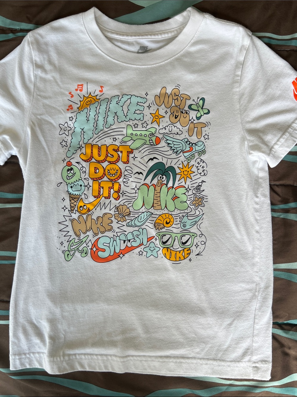 Nike White Short-Sleeve Tee with Colorful Graphic Print